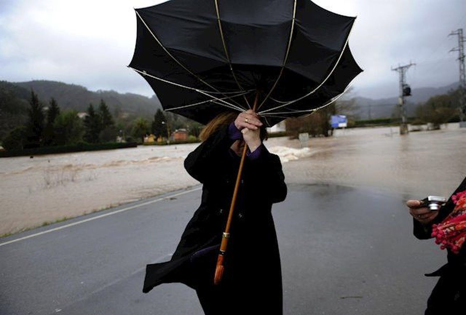 Lluvia viento paraguas