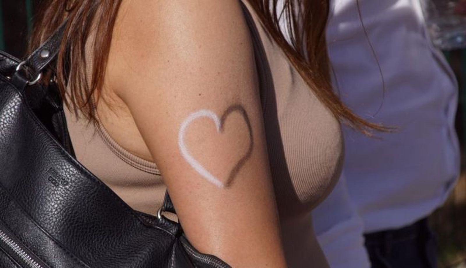 Una aficionada de Unionistas, con un corazón pintado en blanco y negro | FOTO SALAMANCA24HORAS.COM Una aficionada de Unionistas, con un corazón pintado en blanco y negro | FOTO SALAMANCA24HORAS.COM