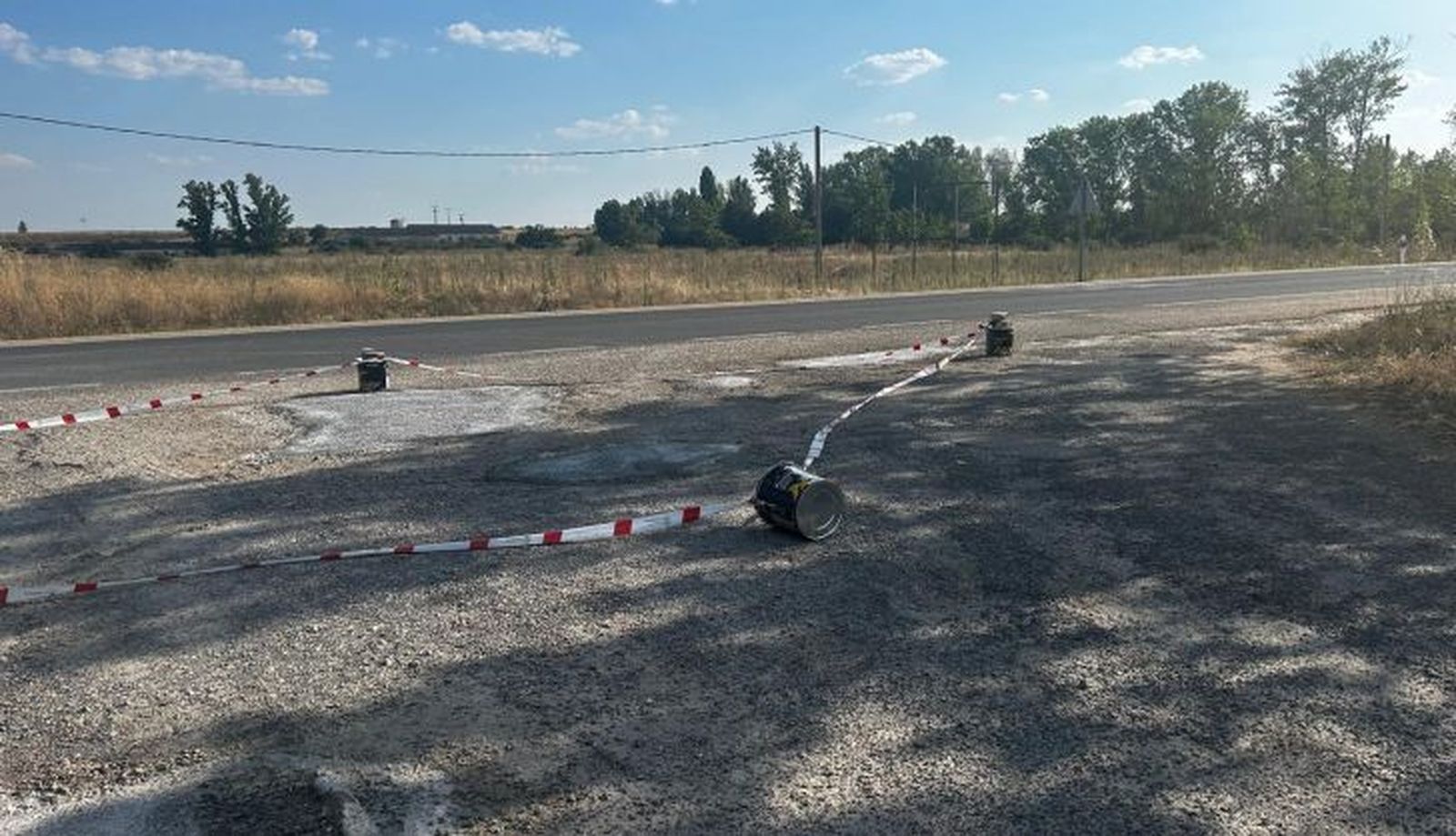 Obras de asfaltado de la carretera en el polígono M