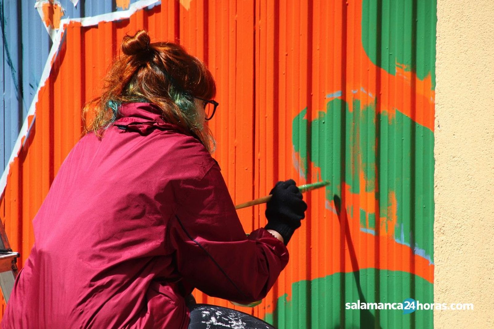 Artista participante en una anterior edición de la 'Galería Urbana' del barrio del E