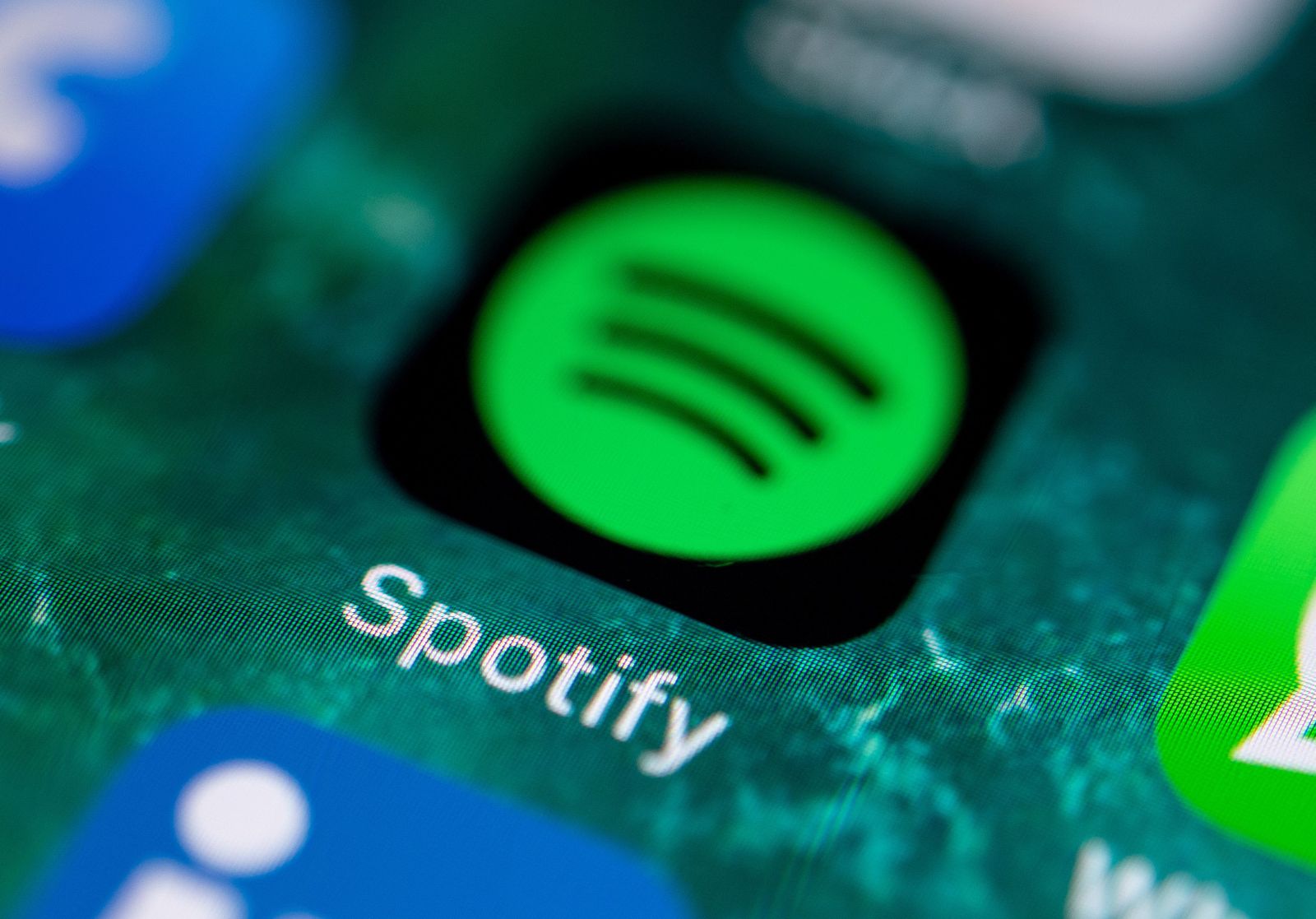 FILED - 21 June 2019, Stuttgart: The app icon of the music service Spotify can be seen on the display of an iPhone. Music streaming service Spotify Technology SA on Wednesday said it had 271 million u
