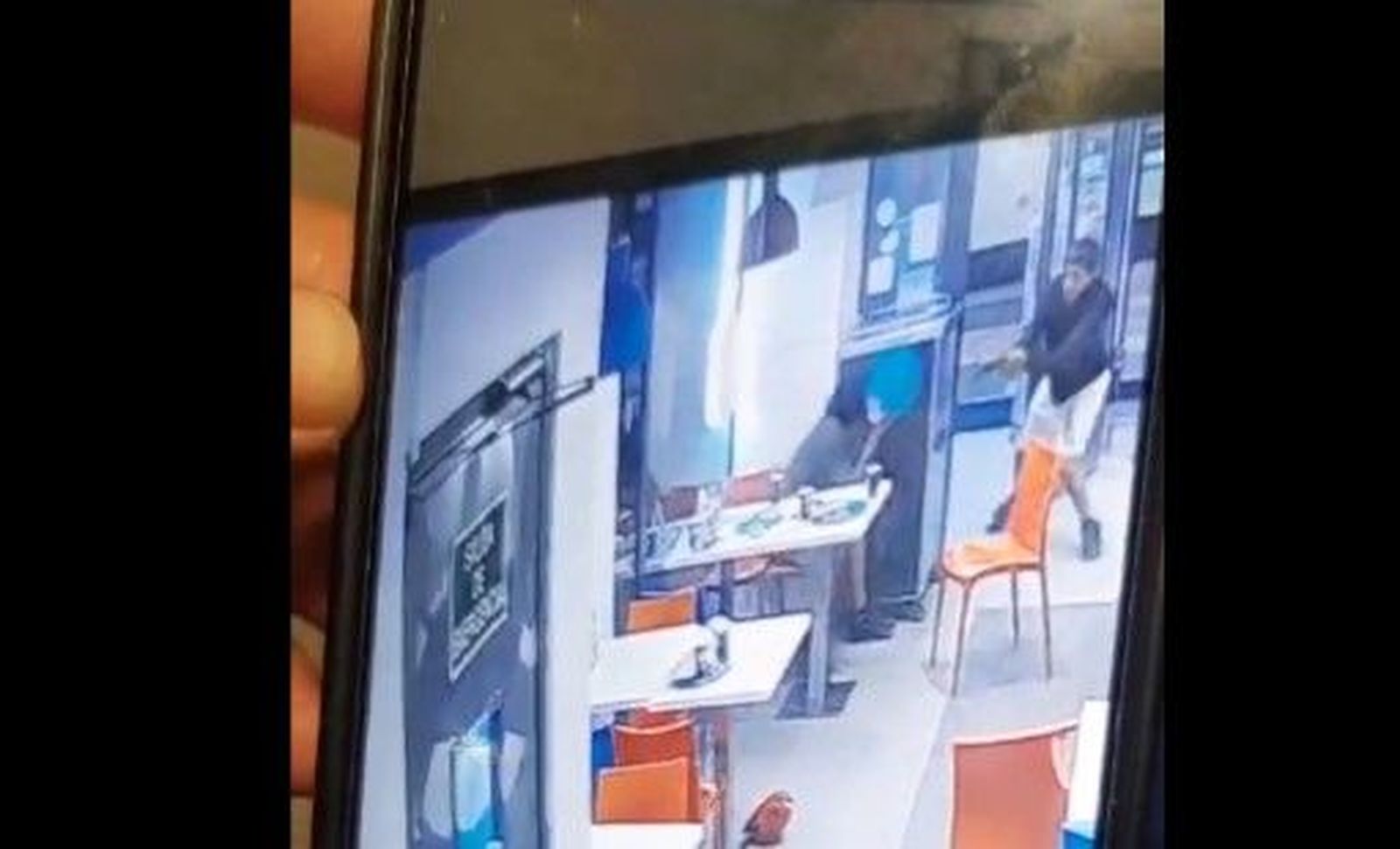 Tiroteo en una pizzería de Madrid. Imagen del vídeo vía 'X' del usuario @PerdigueroASP