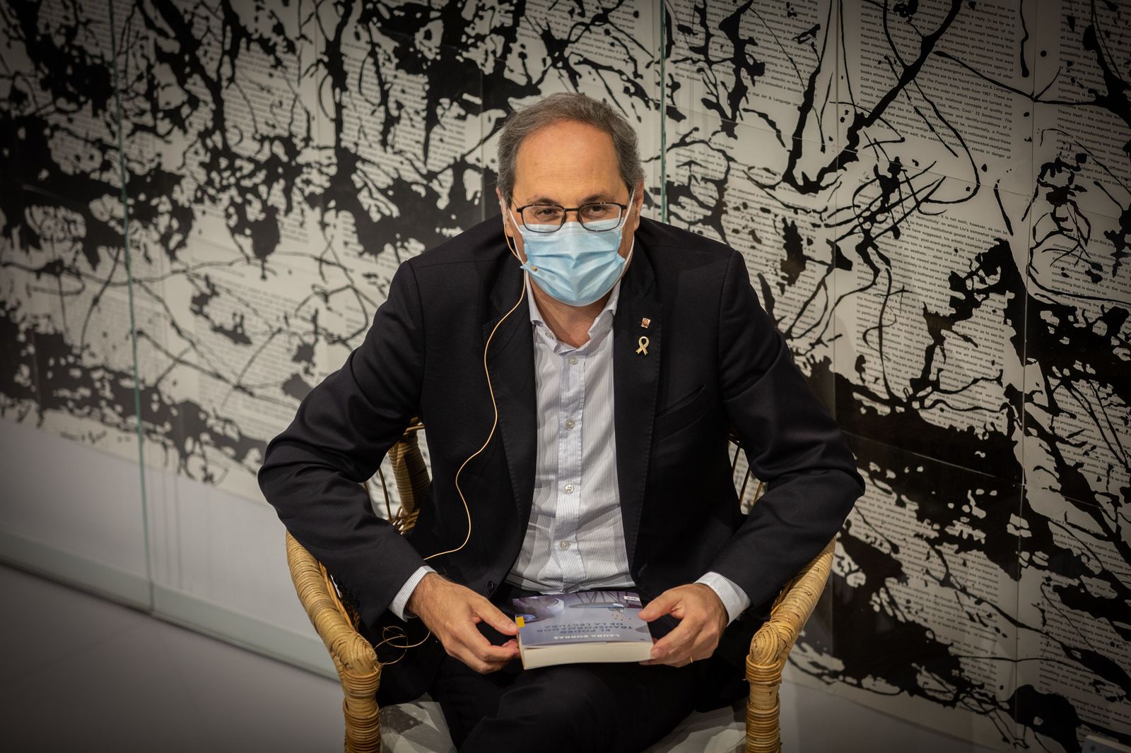 El president de la Generalitat, Quim Torra, durante la presentación del libro de la portavoz parlamentaria de Junts per Catalunya, Laura Borràs, 'El poder transformador de la lectura' en Barcelona,
