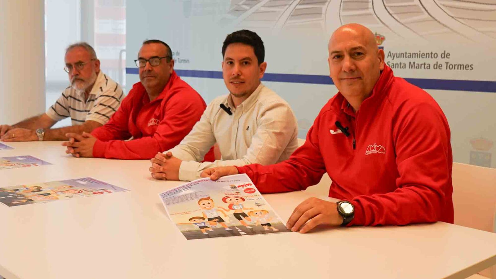 (Manuel Santos, José Santos, Jorge Valiente y José Luis Montes) de la presentación de la X Carrera Solidaria de Santa Marta de Tormes.